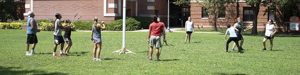 ECU students playing stickball.